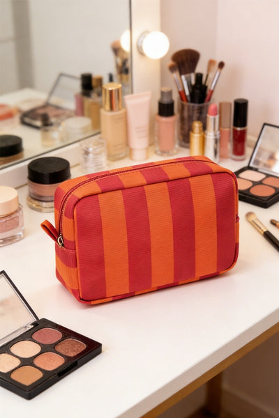 Striped cosmetic travel pouch